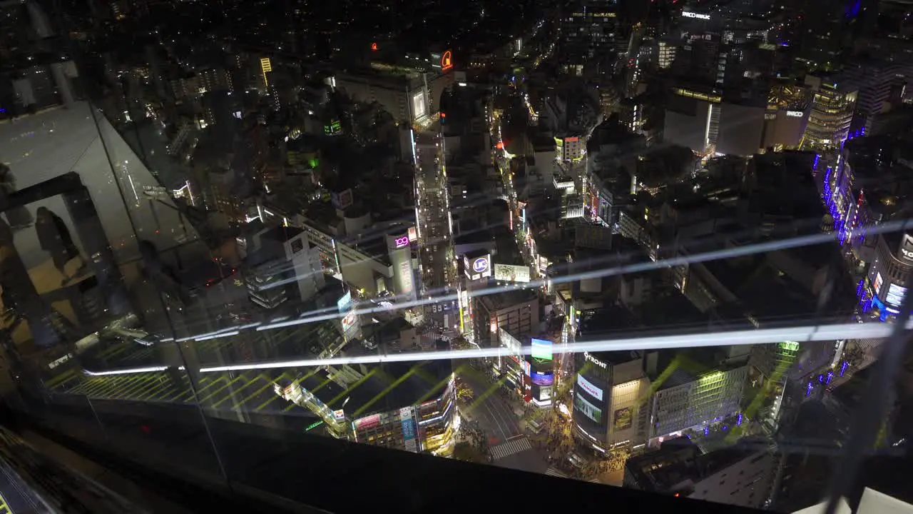 Shibuya Scramble Sky escalator with shibuya scramble and tokyo skyline