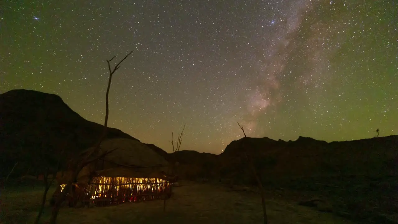 The Milky Way sets over a native house in Iran