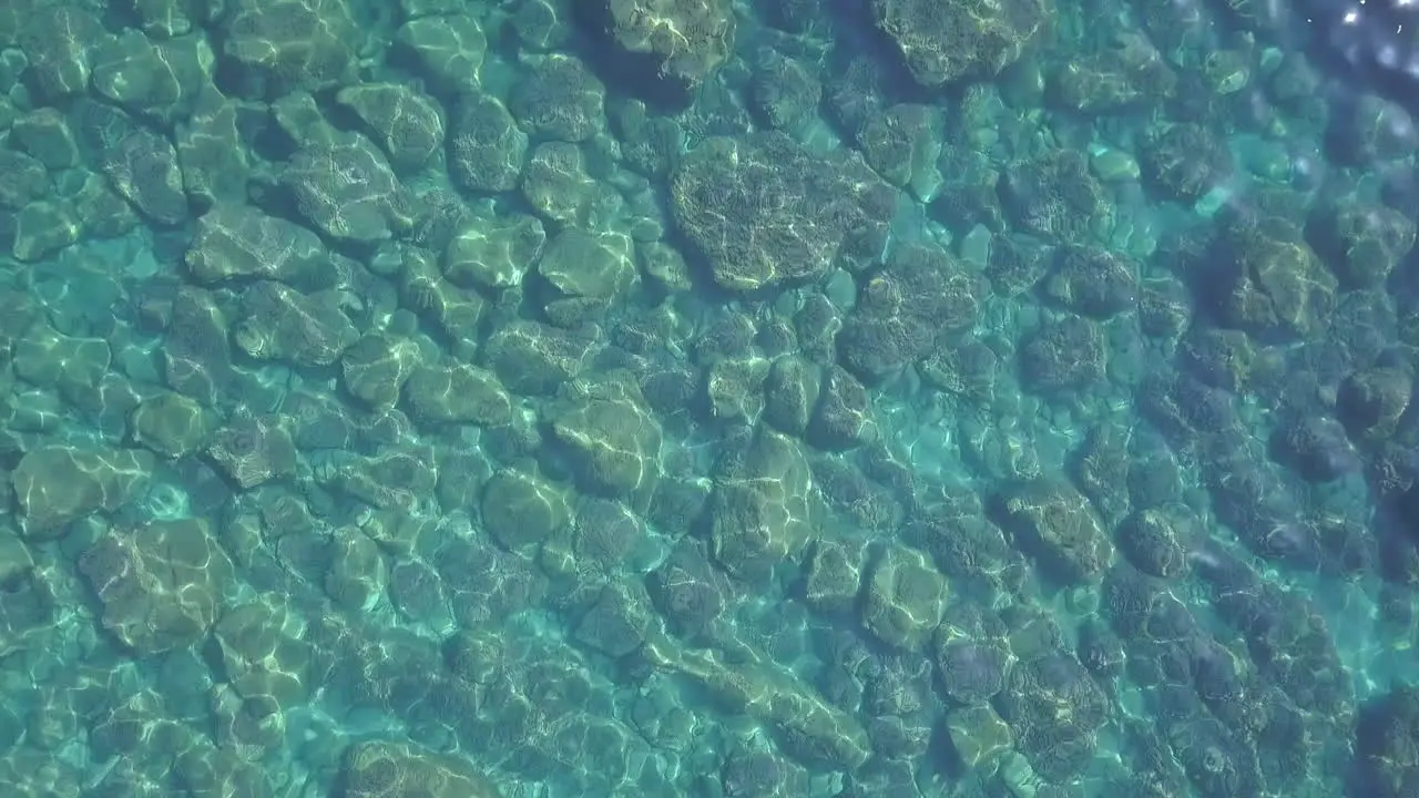 Clear transparent sea bed at sunny day