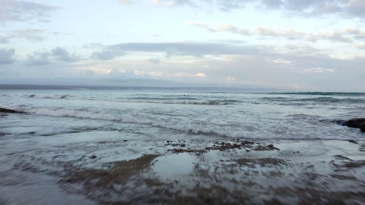 Rocky Shore Ocean Waves And White Clouds In Vleesbaai Western Cape South Africa