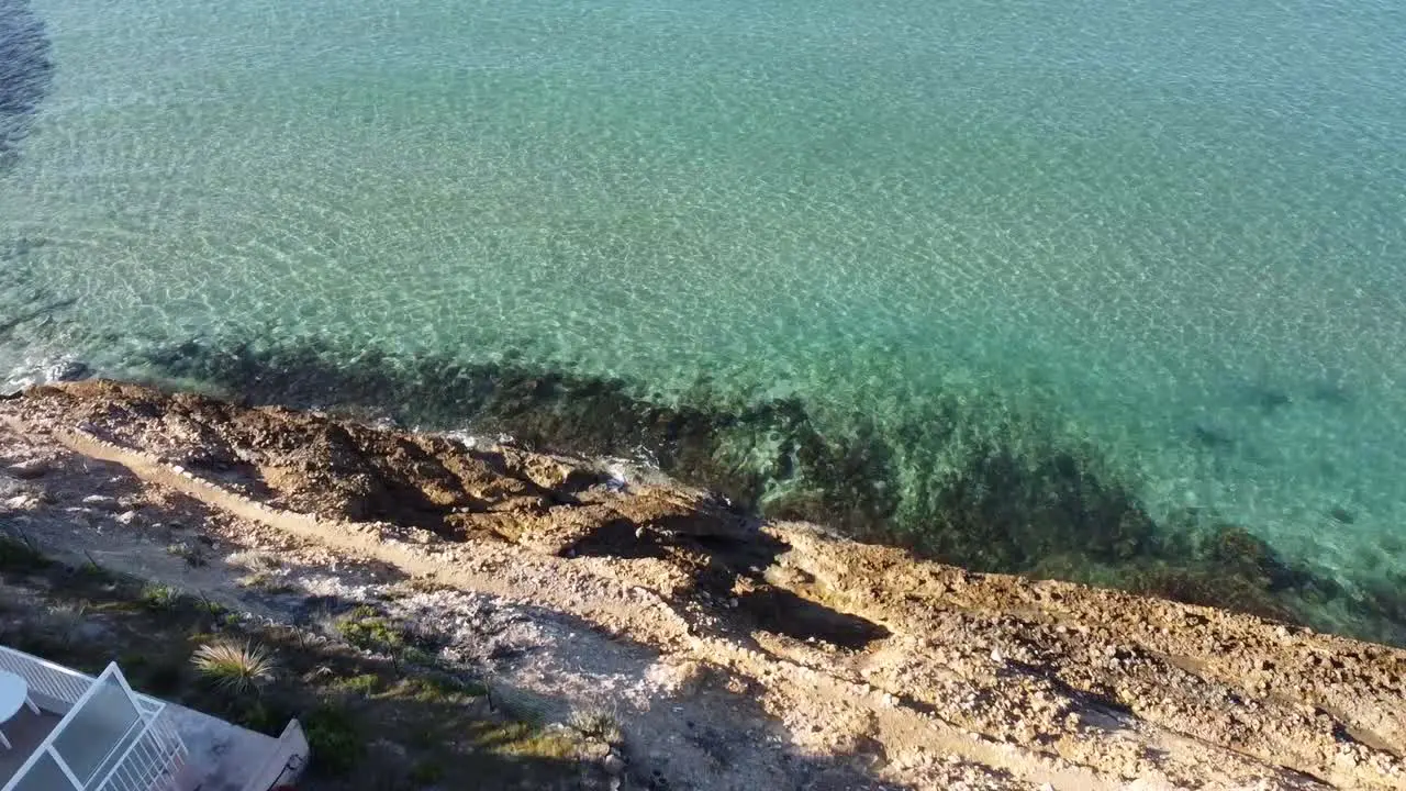 crystal clear turquoise water in the bay of bandol in southern france the sun is shining