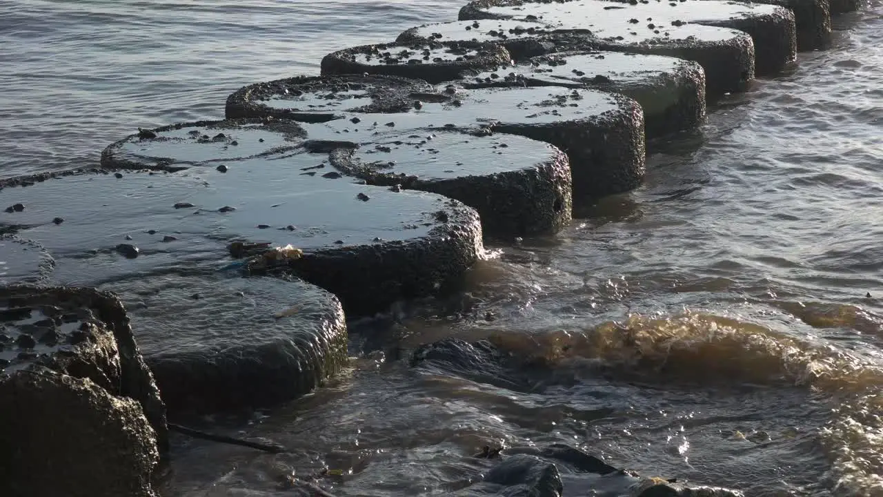 the beach barrier that was hit by the sea waves