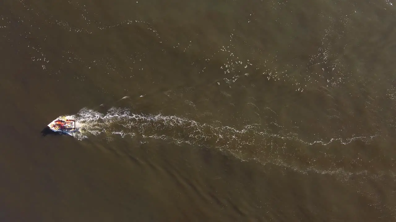 4K30 Fishing boat on the uruguayan coast in the atlantic ocean