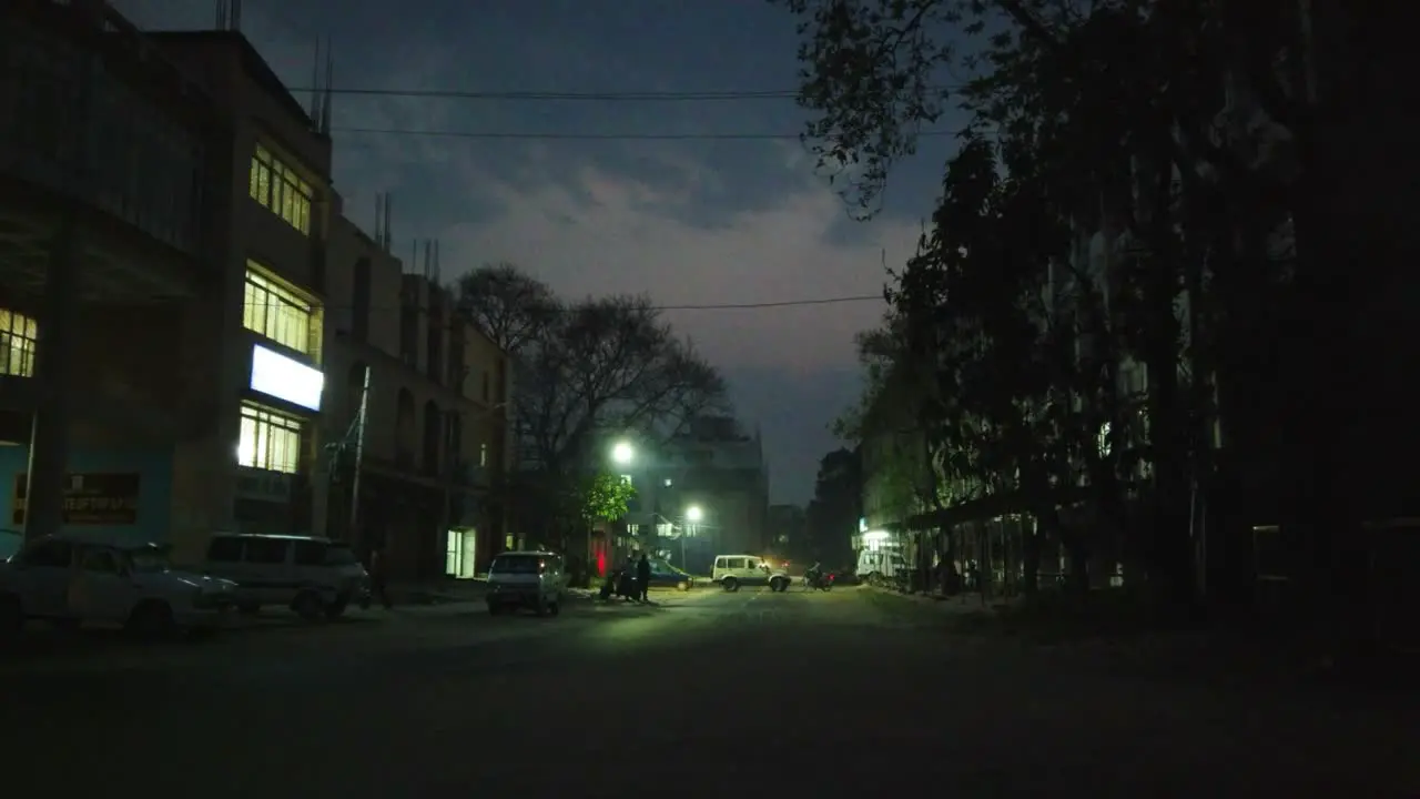 Cars and bikes at midnight on the street