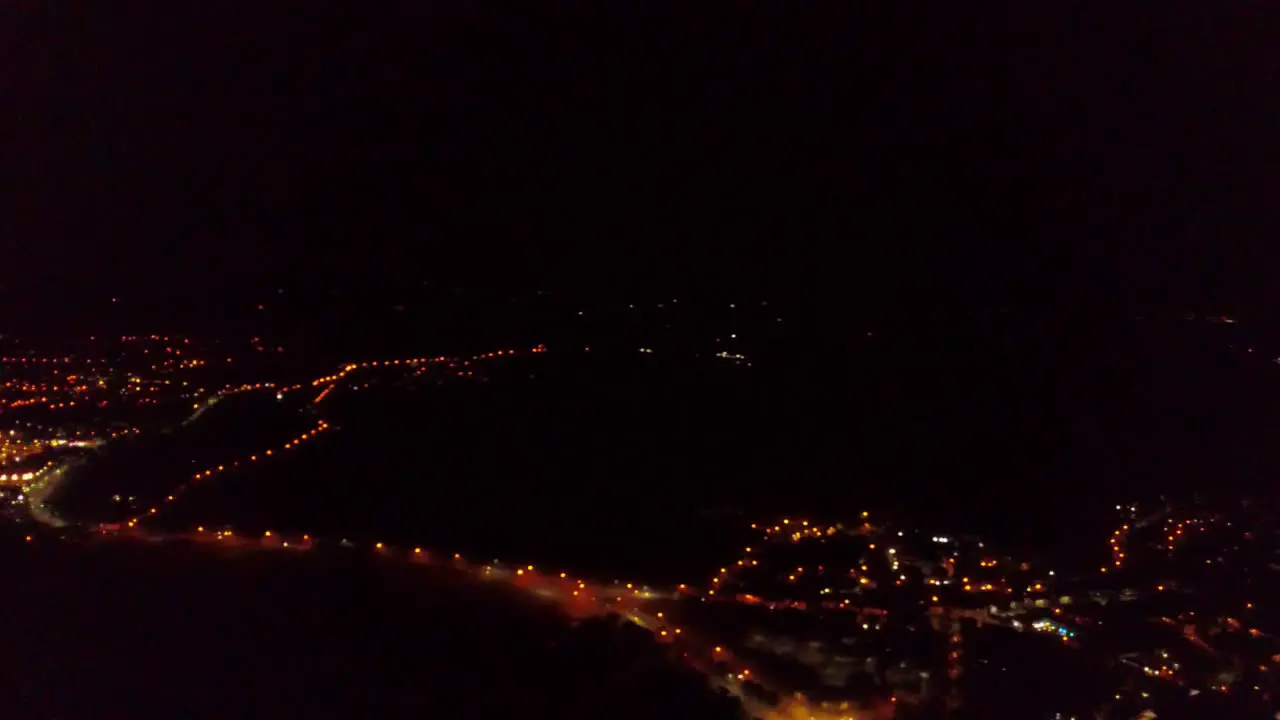 Glastonbury and Street lights at night with misty roads