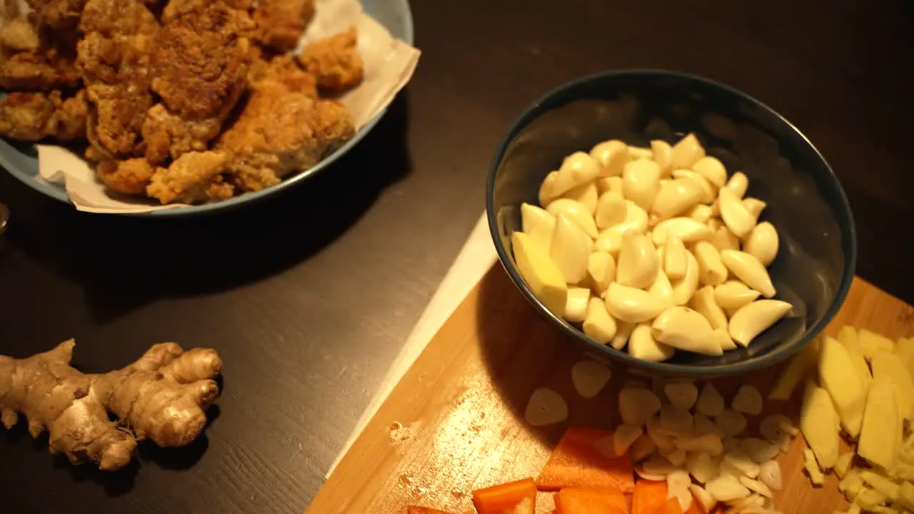 An HD of the crispy bite-sized fried morsels of veal brain carrots leek red pepper green pepper garlic