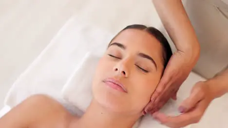 Relax woman and spa face massage for a woman