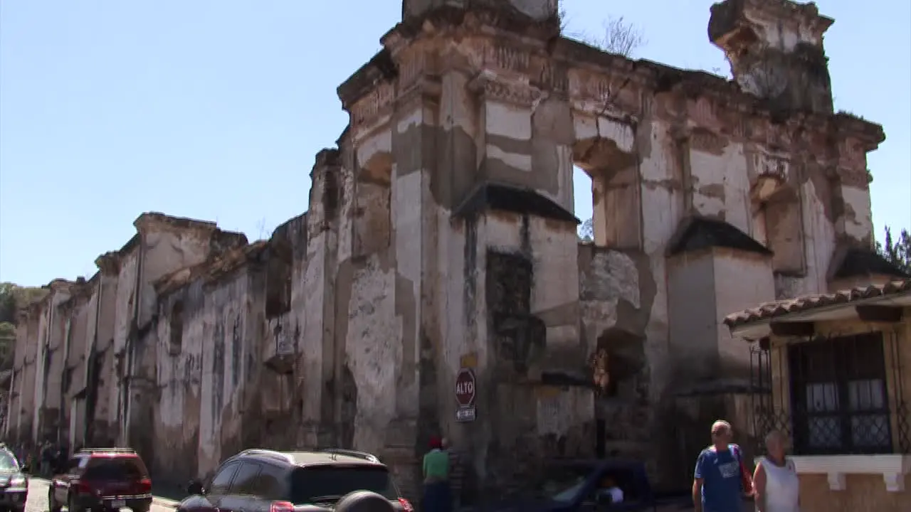 Traffic around the ruins of a old Church in Antigua Guatemala