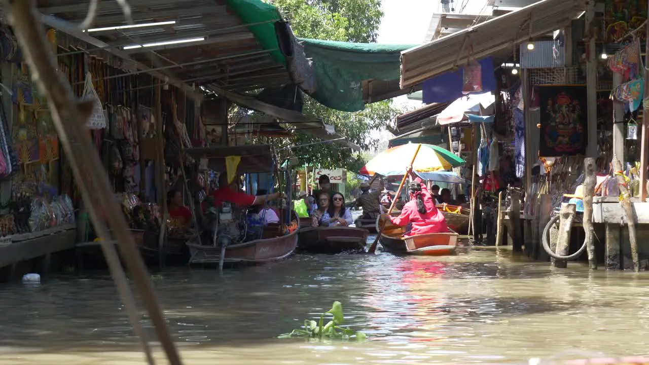 Thailand Saduak the first floating market of Thailand visitor tourist in boats visiting