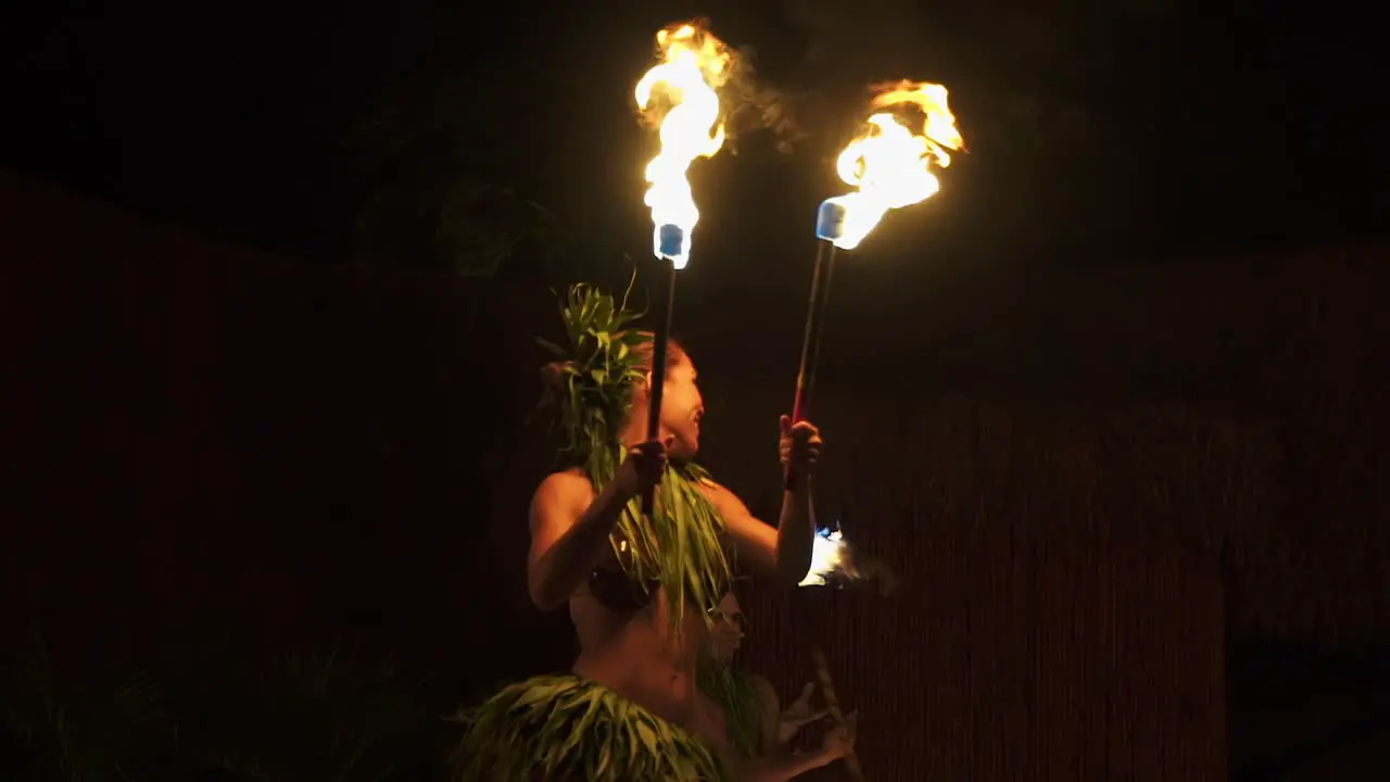 Female traditional Luau Fire Dance Performer