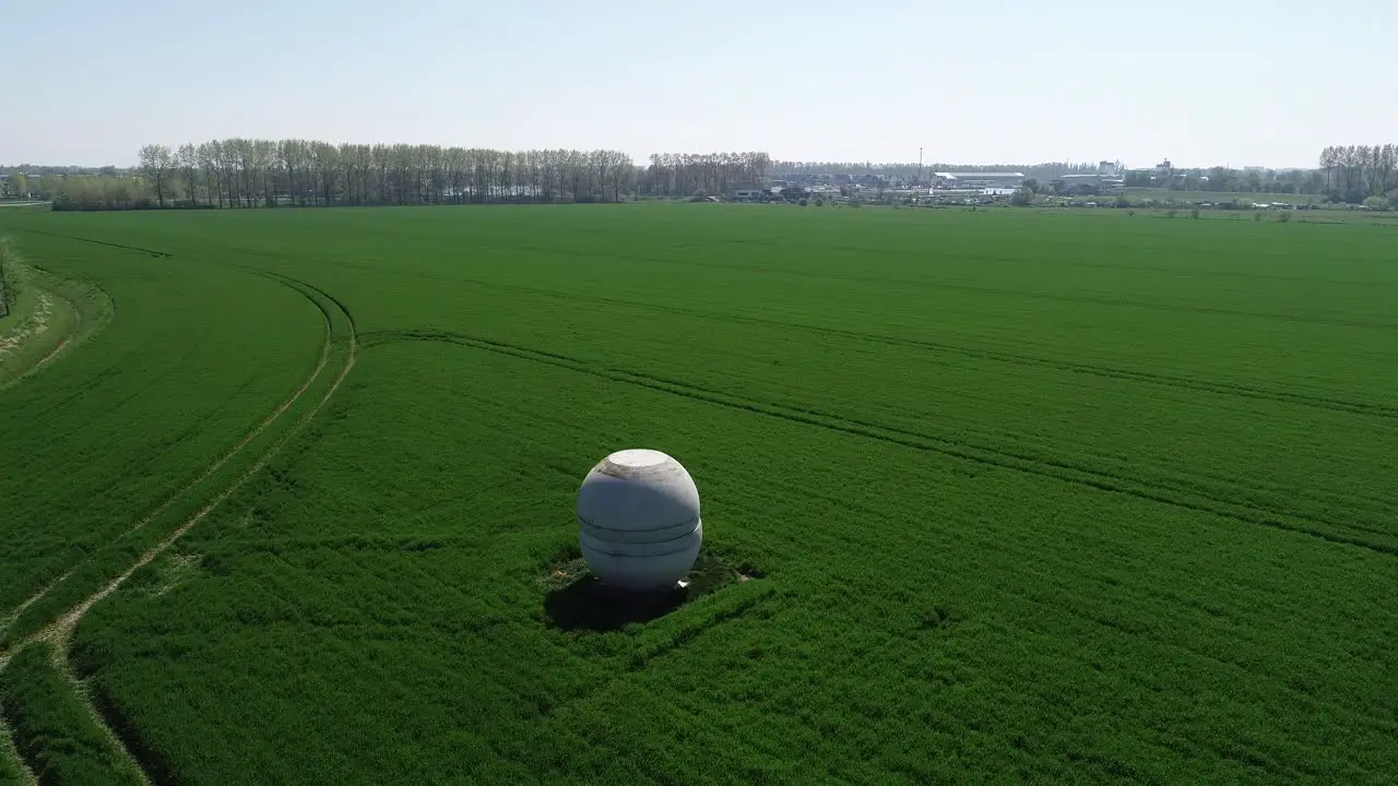 Abstract art statue sky drone view in the netherlands on a grassland