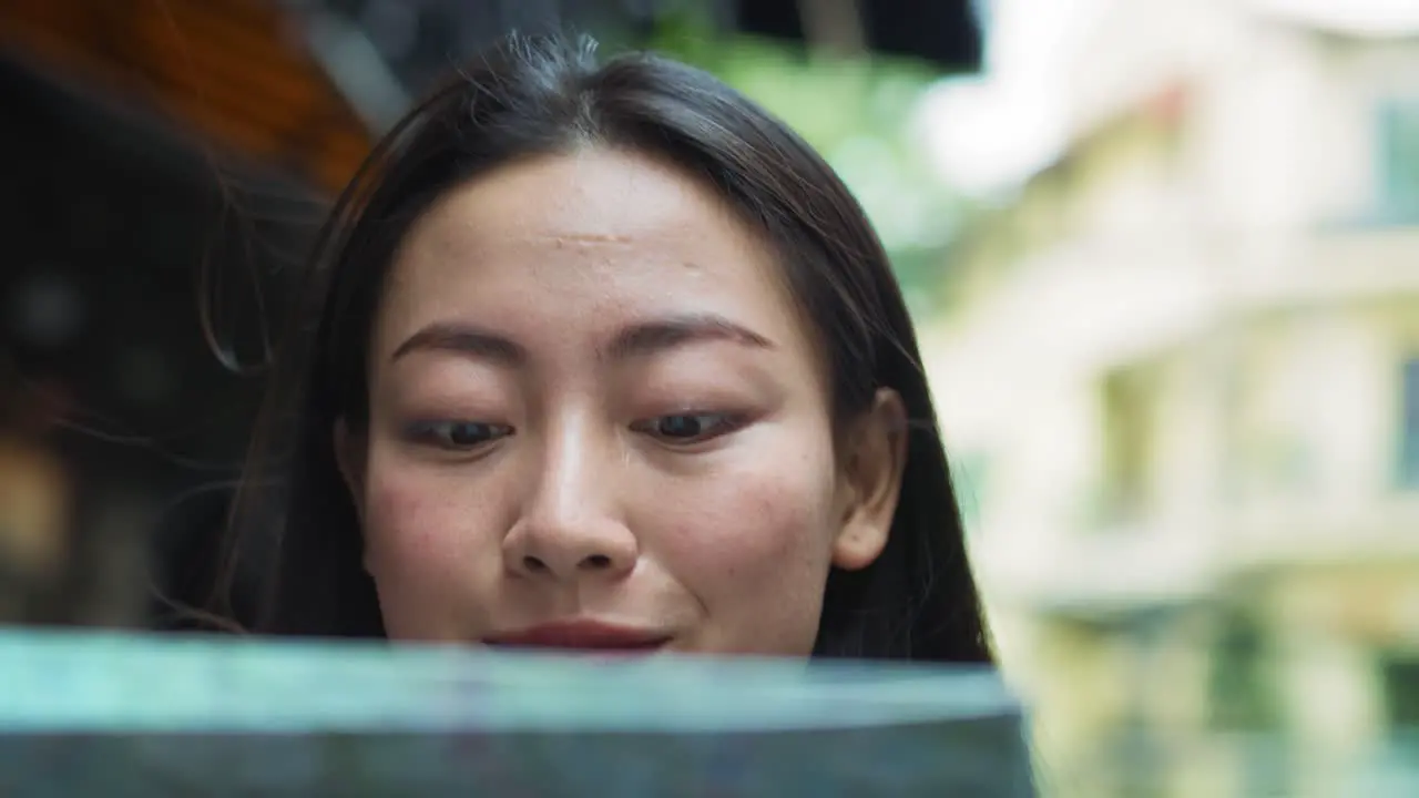 Handheld view of tourist with paper map