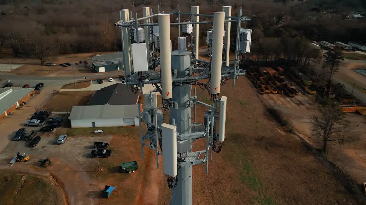 Breathtaking Aerial Shot Revolving Around Cell Phone Tower