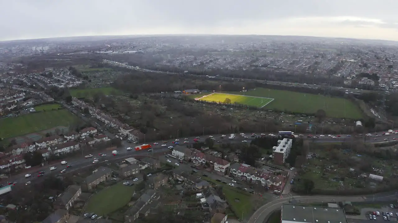 Aerial view of London in the distance with misty moody sky