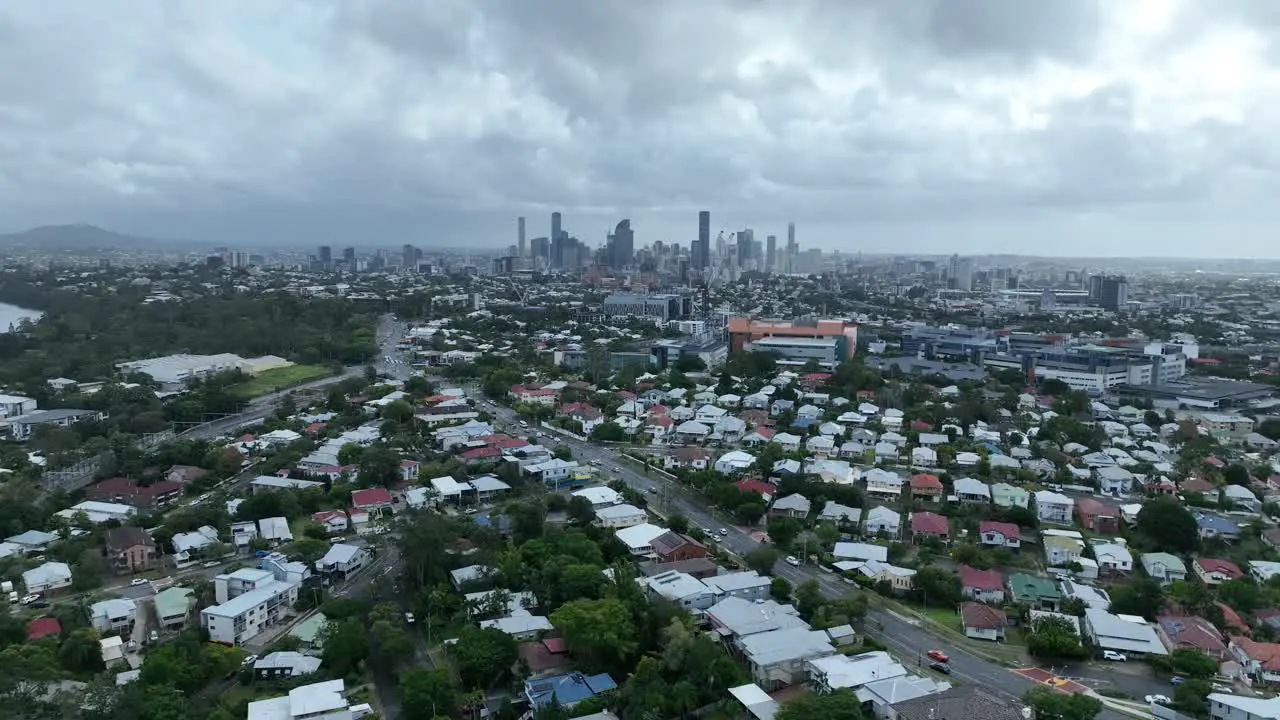 Establishing pull away drone shot of Brisbane City from above Dutton Park