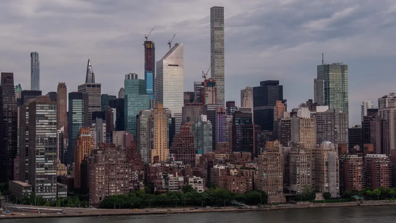 Time lapse of clouds over the skyscrapers at Manhattan Midtown East FDR Drive and East River at Daylight New York City at June 2019