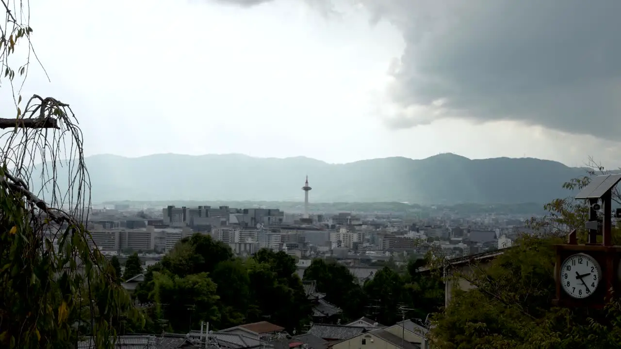 Kyoto City Skyline Viewed From Kiyomizu-Dera With Light Streaks From Behind Clouds