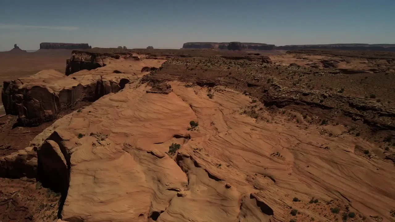 Aerial drone footage that showcases the picturesque vistas of Death Valley's terrain complemented by detailed close-up shots that highlight the distinctive textures of its rocks