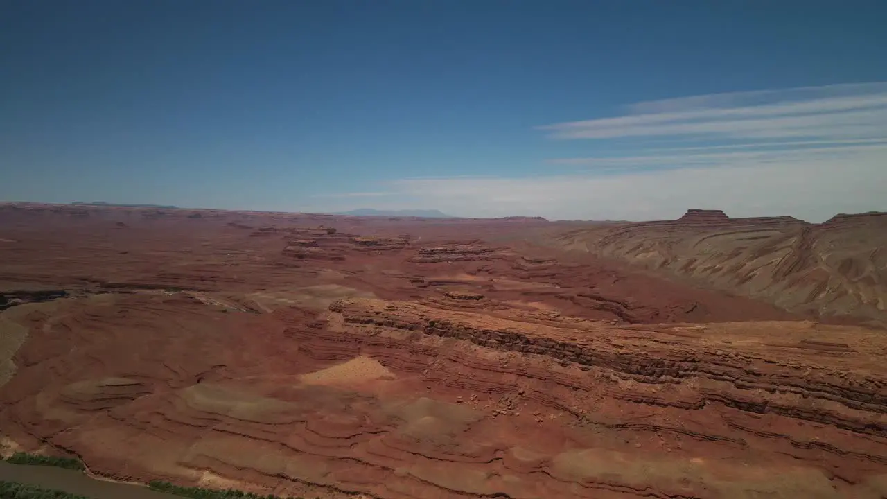 Drone Aerial Cinematic Shot of a stunning scenery of Antelope National Park in Arizona is characterized by the unique textures of its rock formations a meandering river alongside