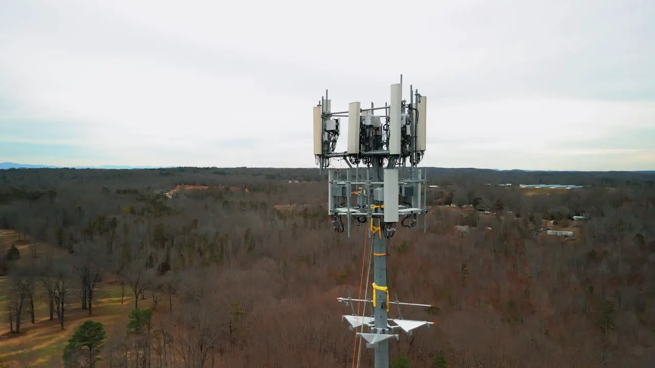 Aerial Shot Revealing Cell Phone Tower in Forest