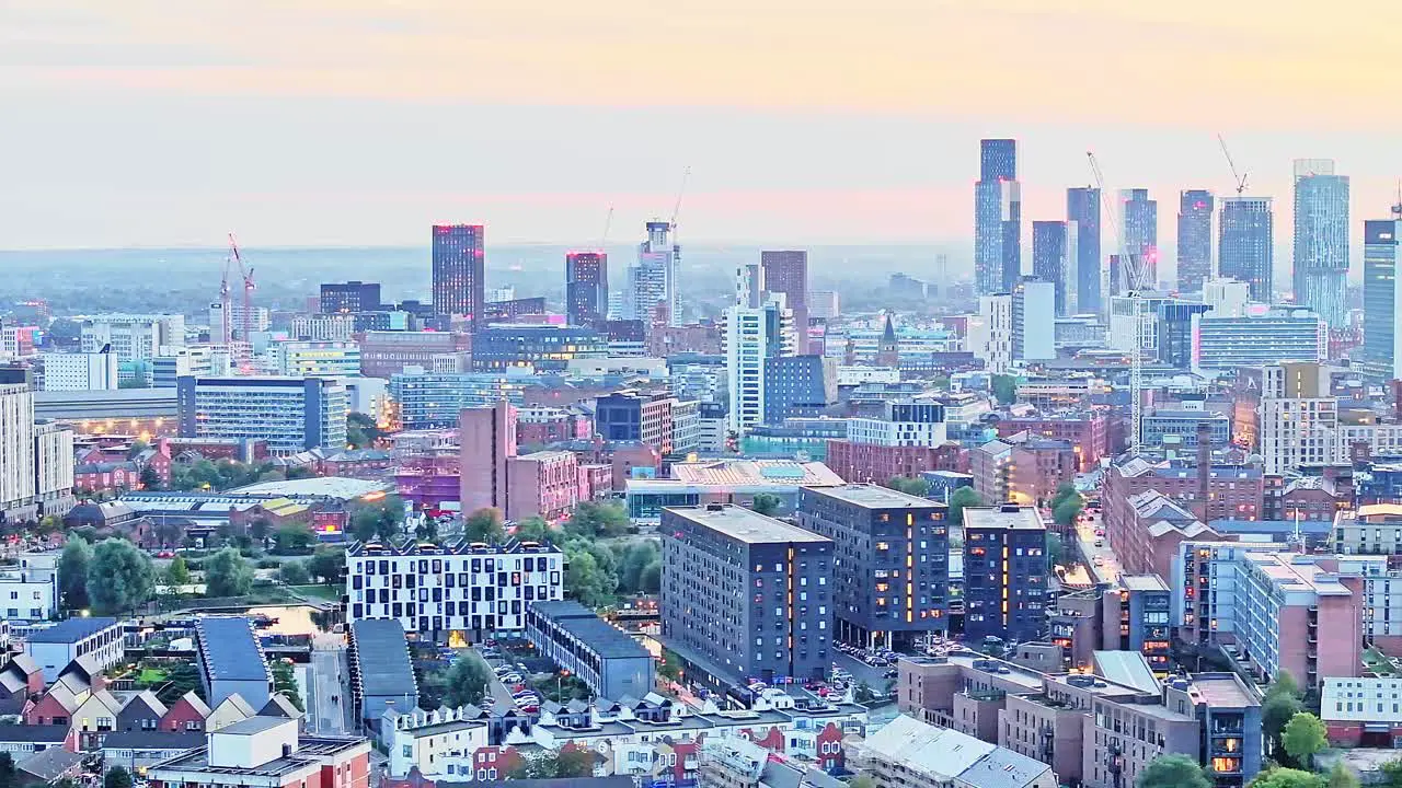 Aerial panorama Manchester City skyline with glass office skyscrapers