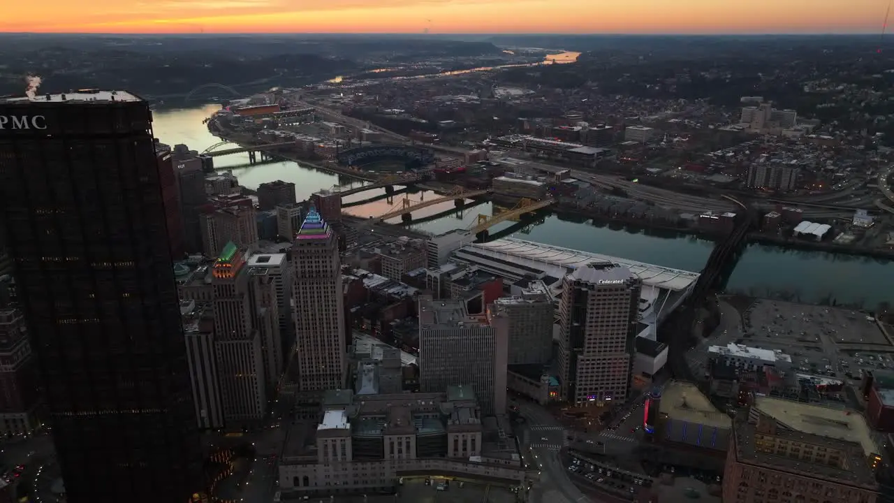 Yellow bridges and rivers near downtown skyline