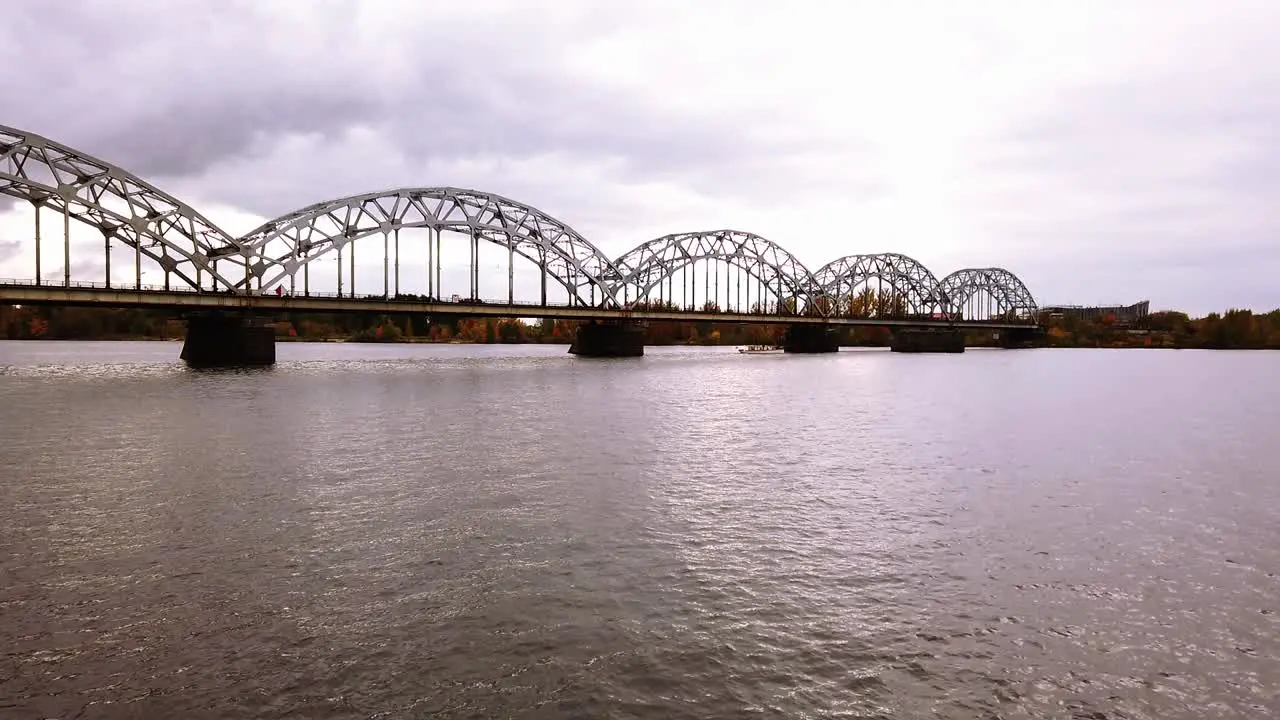 Empty iron railway bridge in Riga Latvia in cloudy autumn day