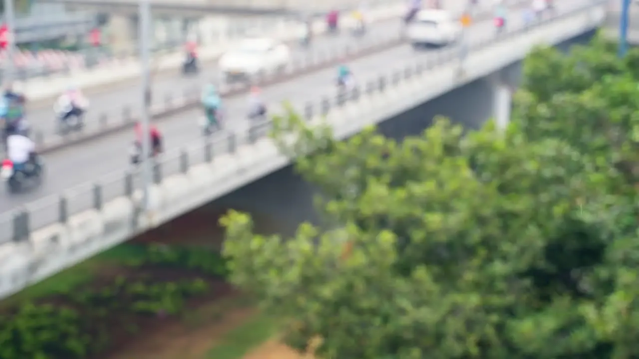 Rain drop with blurred traffic on the bridge background