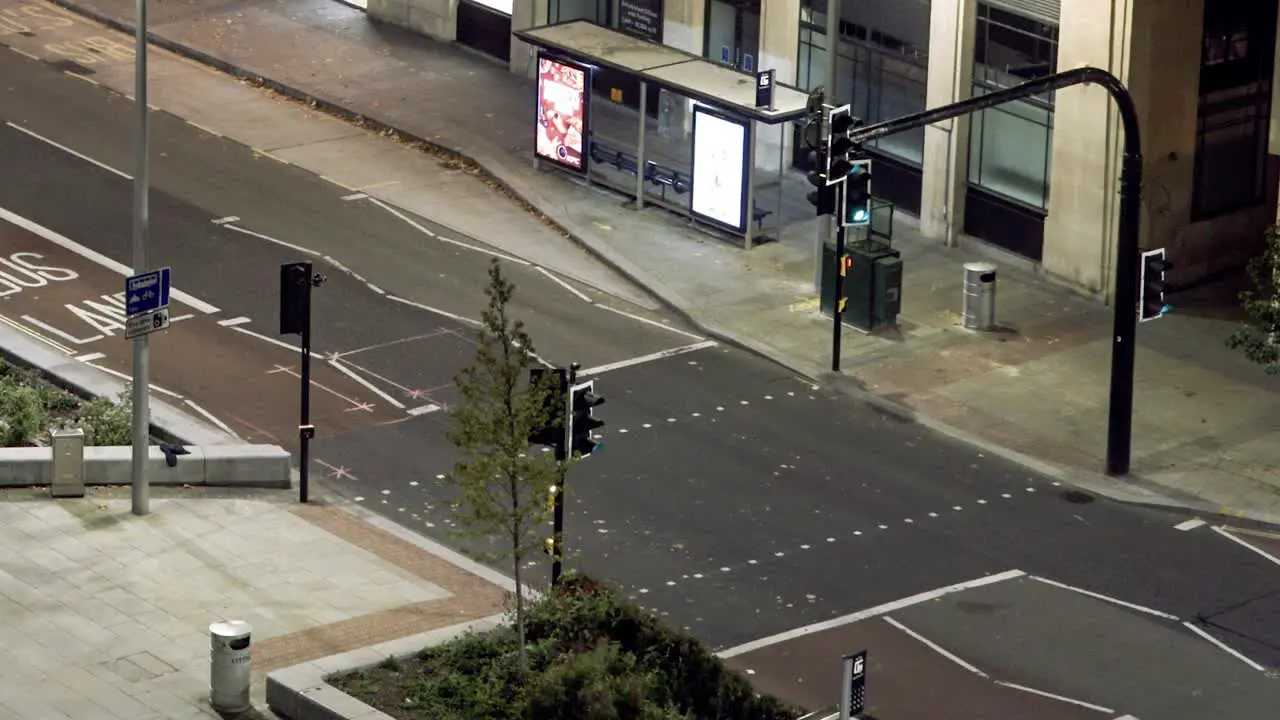 Night time lapse of traffic lights and pedestrian crossing