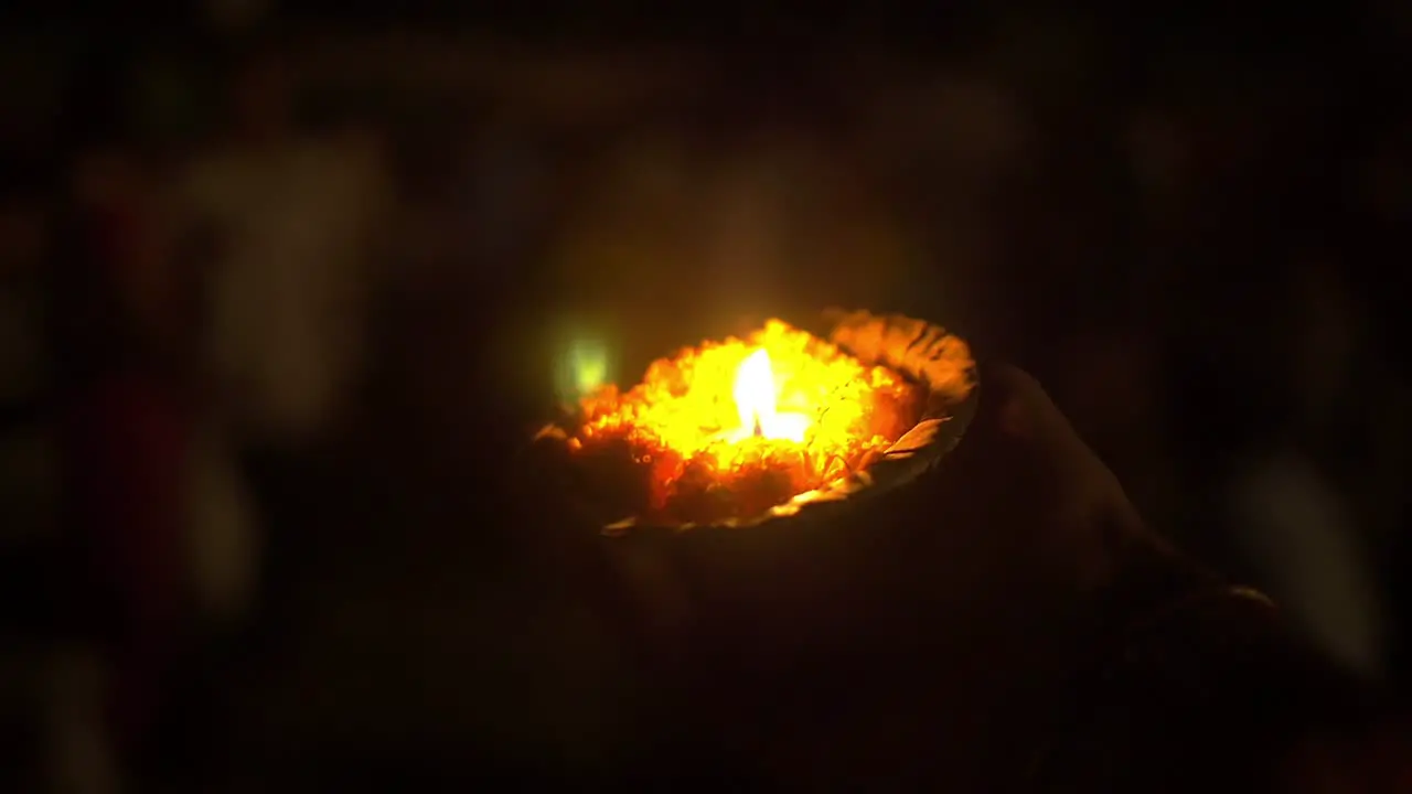 Puja Candle and Flowers at Ceremony in Varanasi