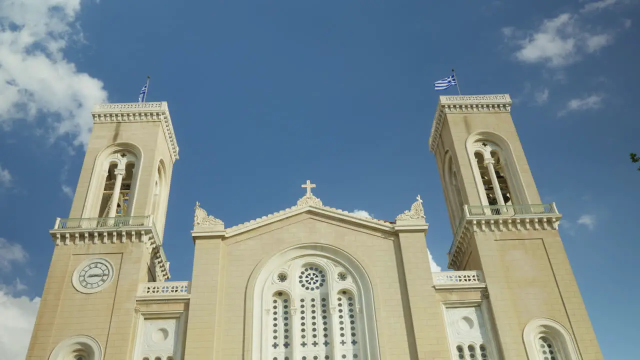 Majestic cathedral facade with bell towers under clear skies