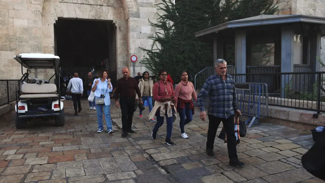 muslim lady walking along streets of Jerusalem