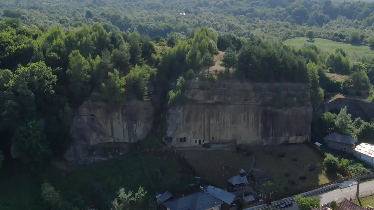 Romanian monastery carved in in a large mountain formation