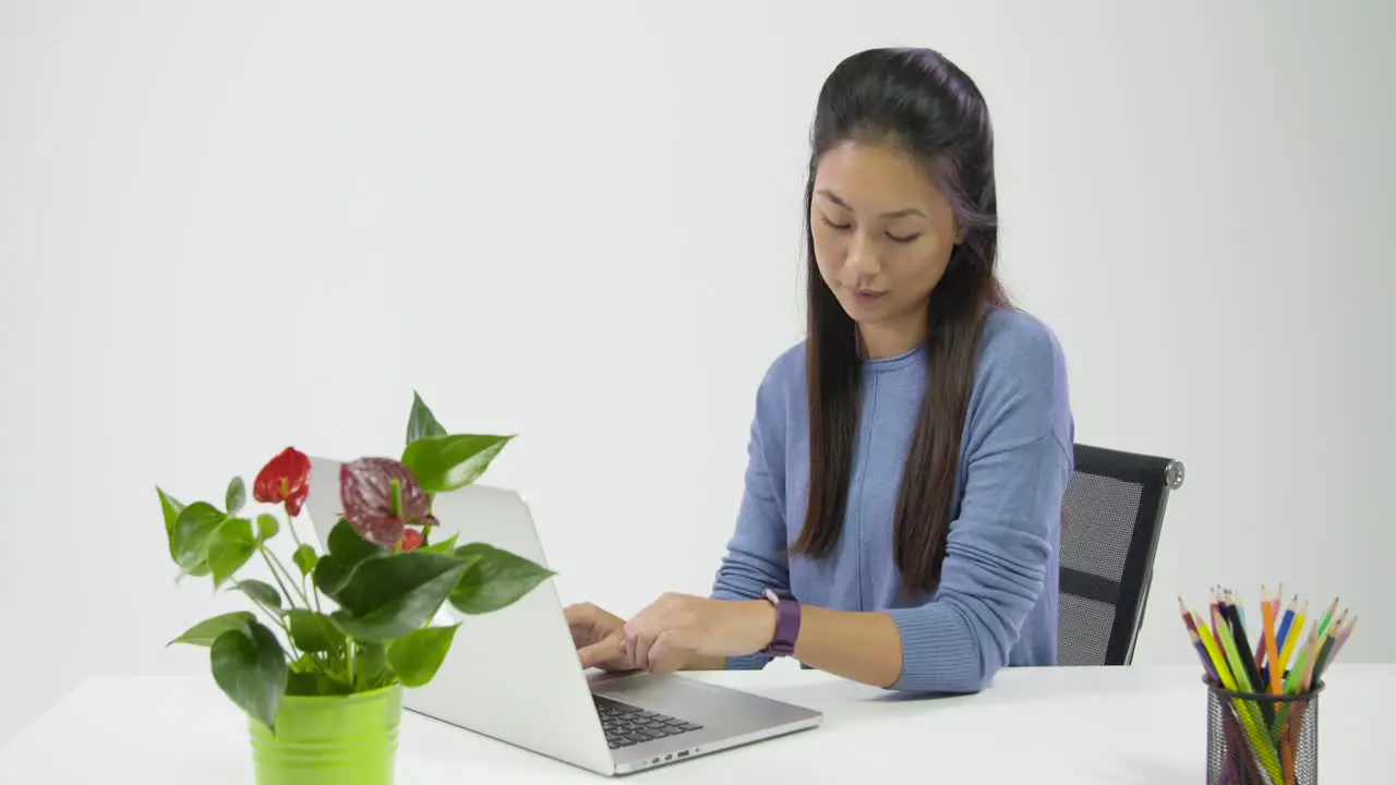 Young Lady Checking Fitbit