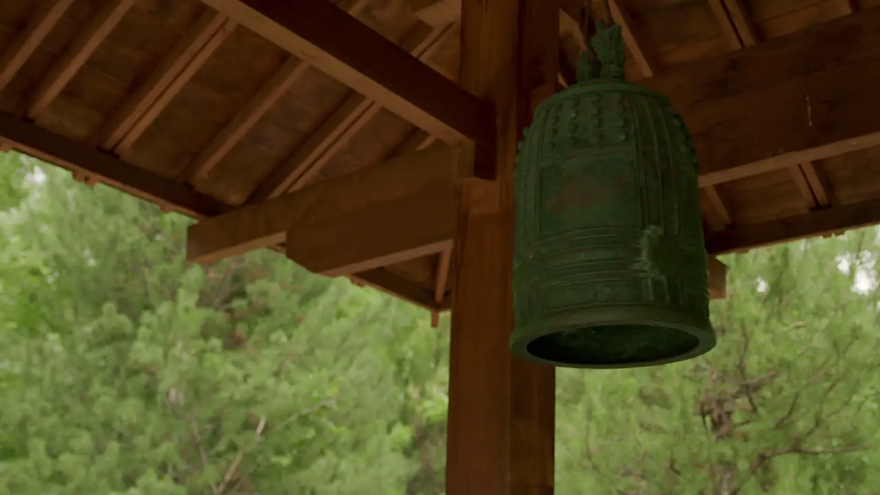 Temple bell moving in the breeze medium close up