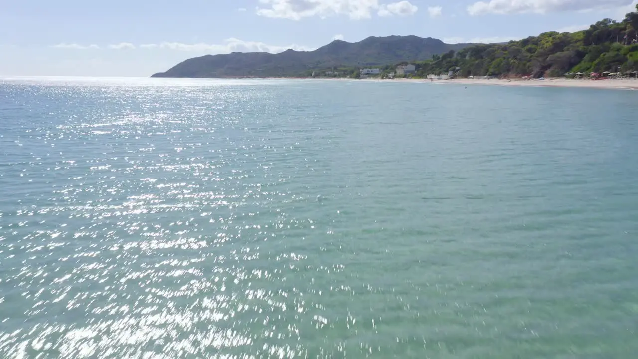 sailing on the blue water close to the coast