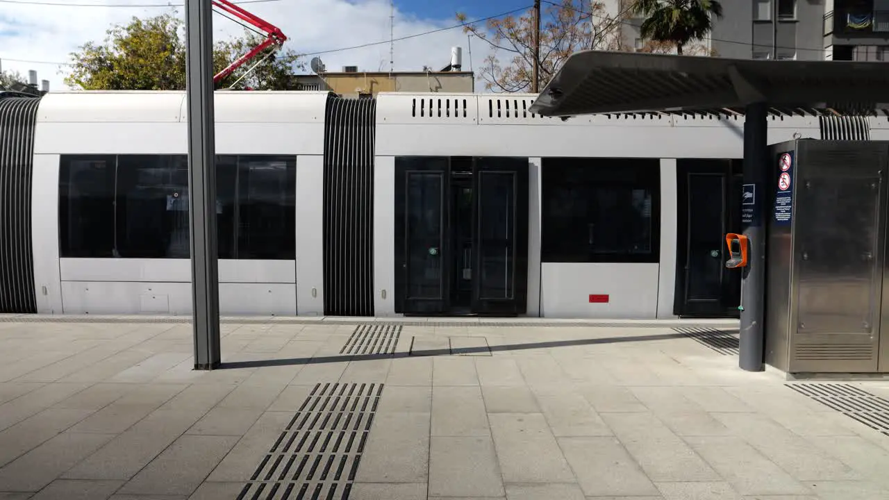 Doors closing on tram public transportation establishing shot