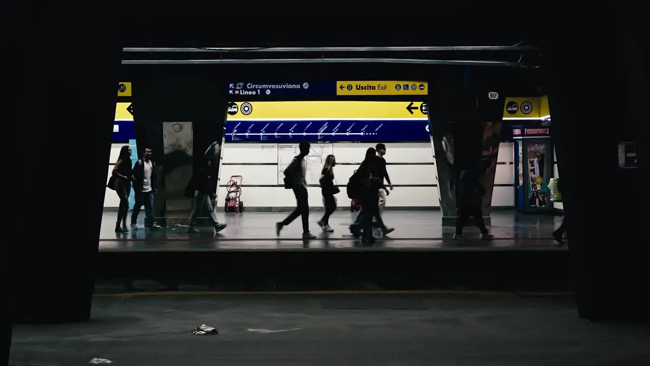 Silhouetted Passengers at Naples Garibaldi Station Italy