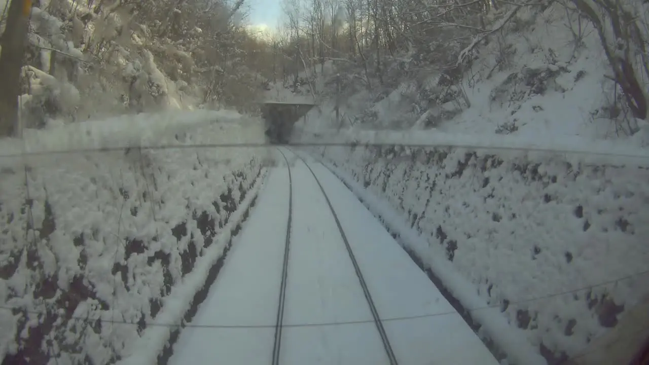 Train travels on a snow-covered track