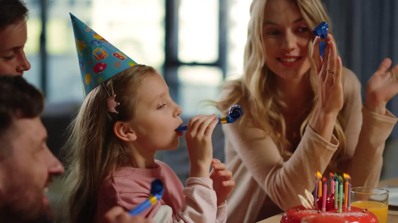 Family enjoying virtual party Parents siblings celebrating birthday online