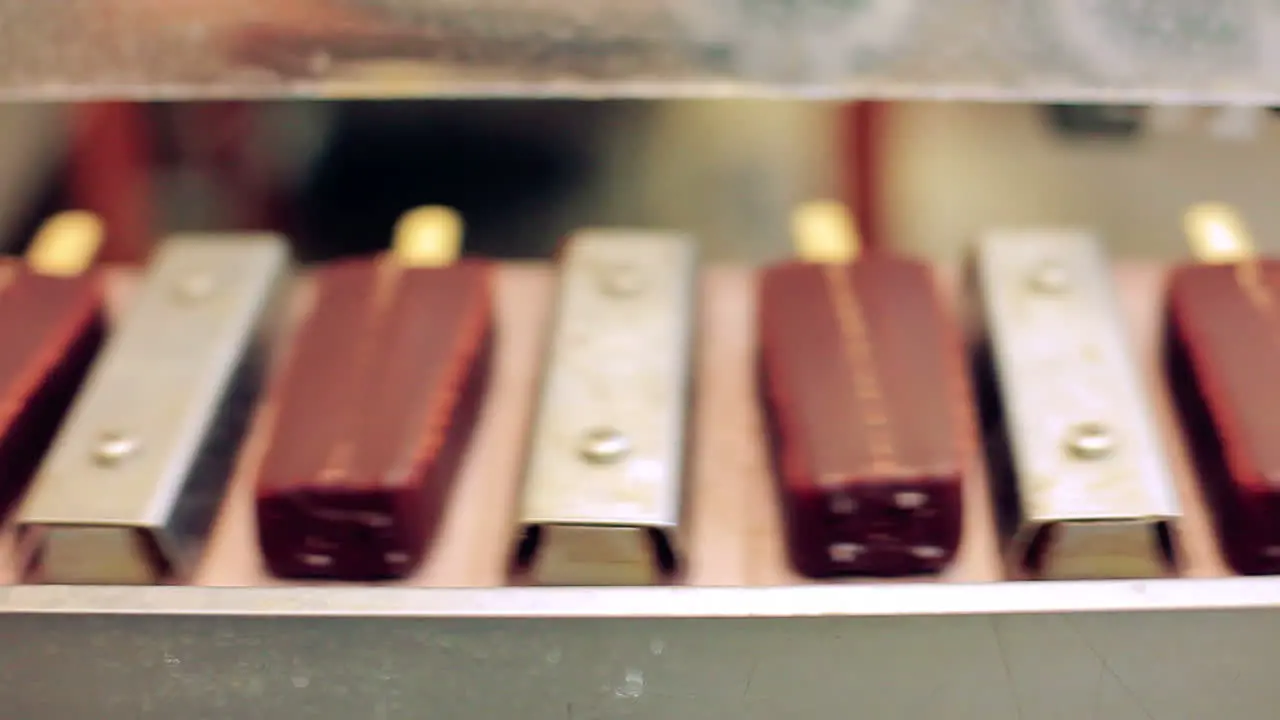 Chocolate ice cream manufacturing line Food factory Food on conveyor belt