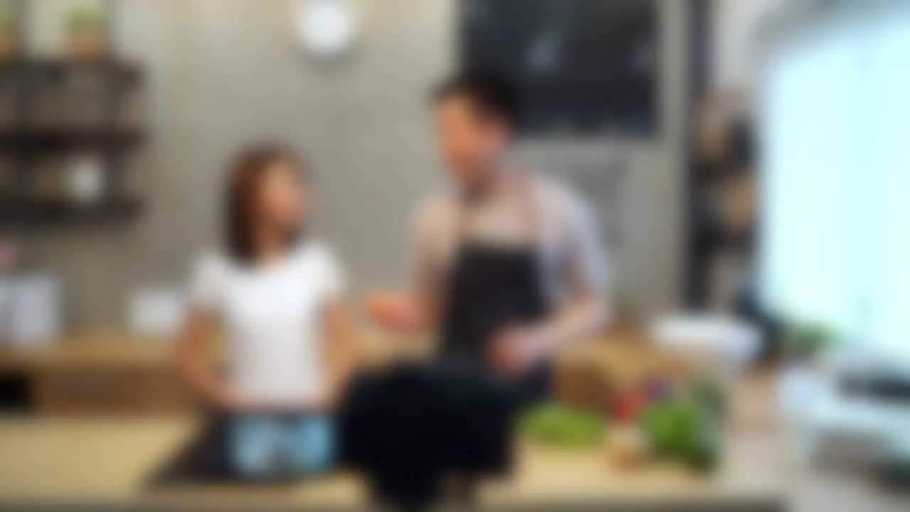 Blurred shot of chef couple food influencers creating cooking video content online YouTube creator concept