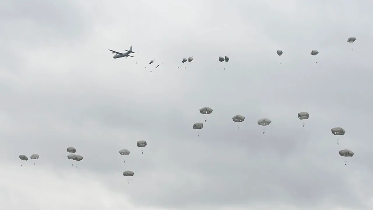 Us Army Paratroopers Parachute From A Plane In A Large Military Exercise 1