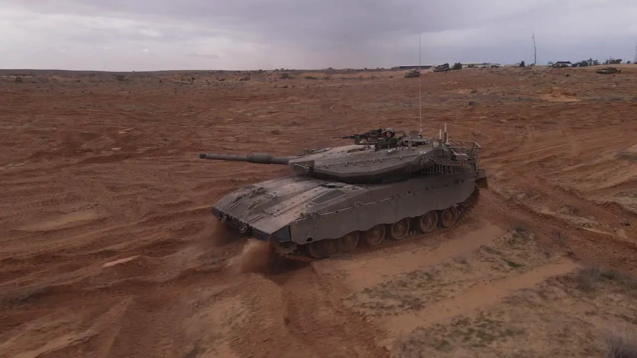 Tank driving on the battlefield with turning turret military war footage