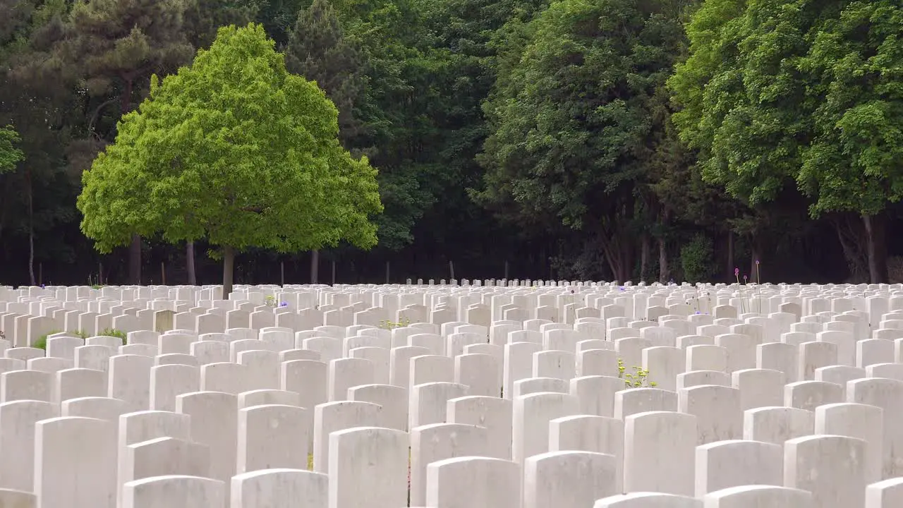 Establishing shot headstones of the Etaples France World War cemetery military graveyard and headstones of soldiers 2