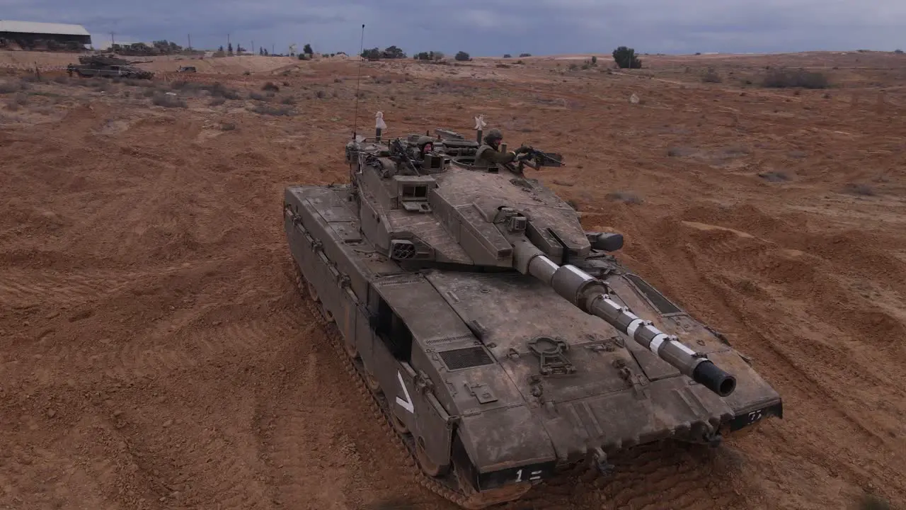 Israel defense forces tank with soldiers Merkava tank aerial view