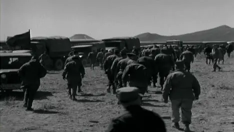 1955 American Military Personnel Walking to Transport Vehicles In the Desert 