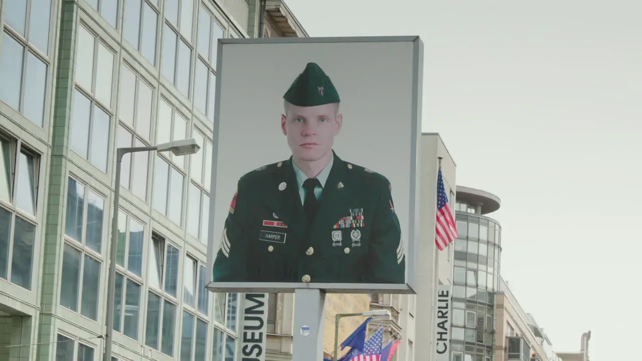 A close-up of a statue of a soldier at Checkpoint Charlie in Berlin a significant monument from the Second World War