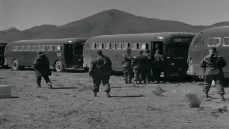 1955 American Military Personnel Boarding Vehicles In the Desert 