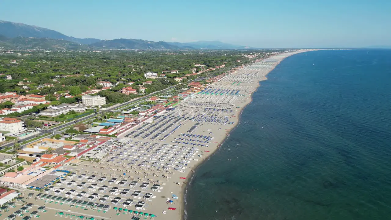 Beach and Coastline of Forte dei Marmi at Summer Vacation in Tuscany Italy Aerial 4k